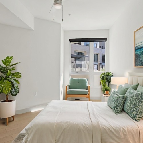 Bedroom with natural lighting and high ceilings