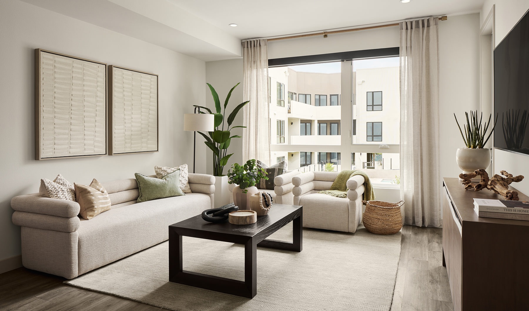 bright, open concept apartment interiors with over sized windows